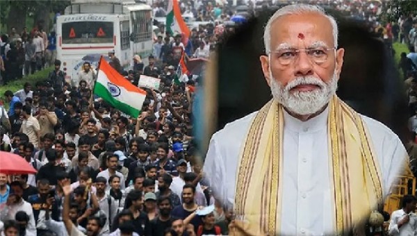 ভারতে চলমান আন্দোলনে শিক্ষার্থীদের অংশগ্রহণ, ইনসেটে প্রধানমন্ত্রী নরেন্দ্র মোদি